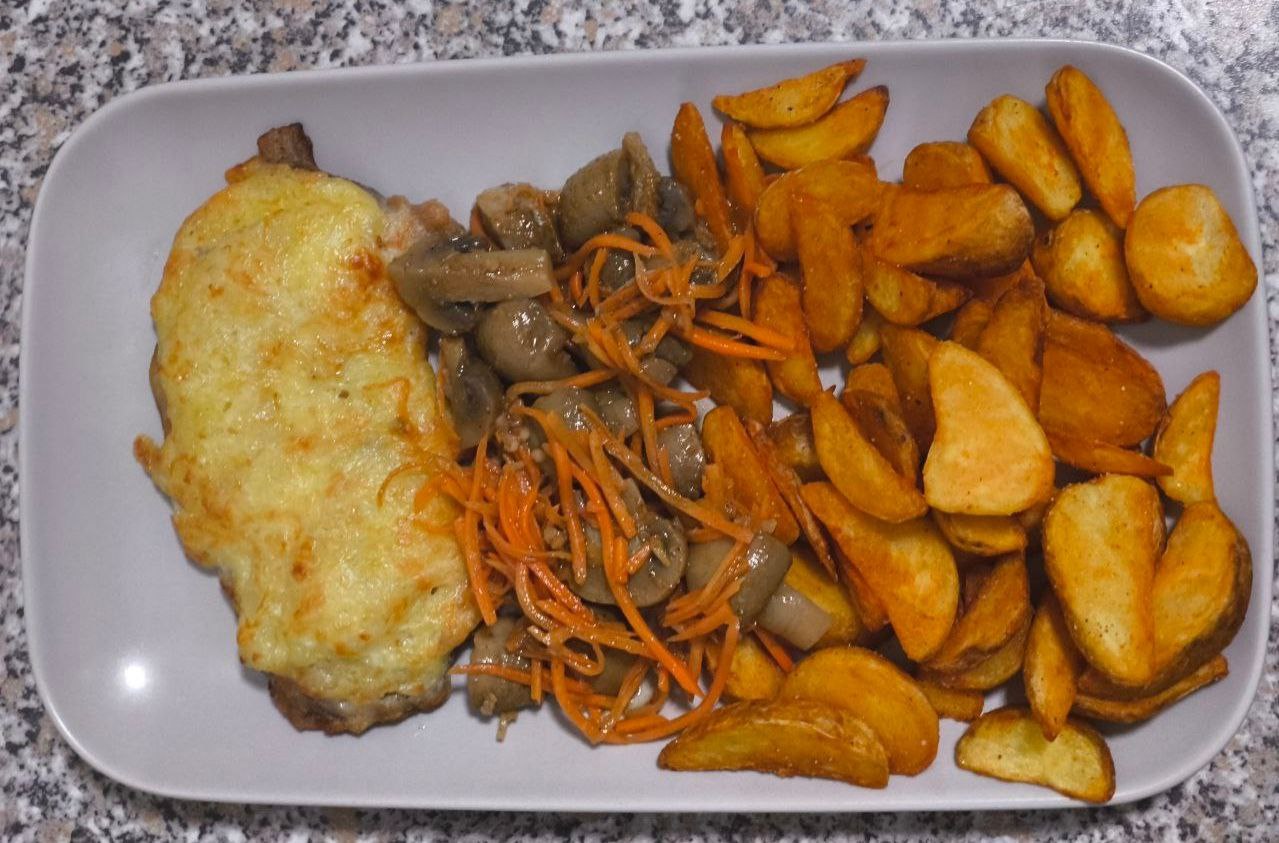 Hähnchenschnitzel mit Käsehaube